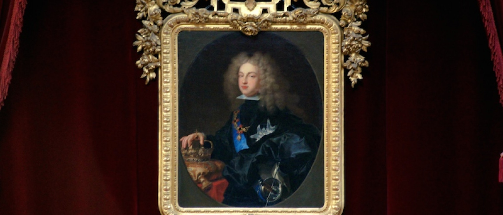 Retrato de Felipe V que preside el salón de actos de la RAE.